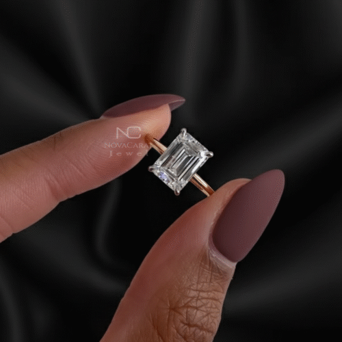 Emerald cut solitaire diamond engagement ring in yellow gold with dainty band captured in natural light, a romantic ethical proposal ring for her. Emerald Lab Diamond Solitaire Ring, Two Tone Solitaire Engagement Ring, 14k Gold Dainty Band, Wedding Ring For Women, Lab Diamond Thin Ring, Diamond Gold Ring, Emerald Ring For Her Gift, Unique Lab Diamond Ring, Dainty Minimalist Wedding Ring, Low Profile Set Ring, 14k Yellow Gold Flush Fit Engagement Ring, Gift For Wife / Mom