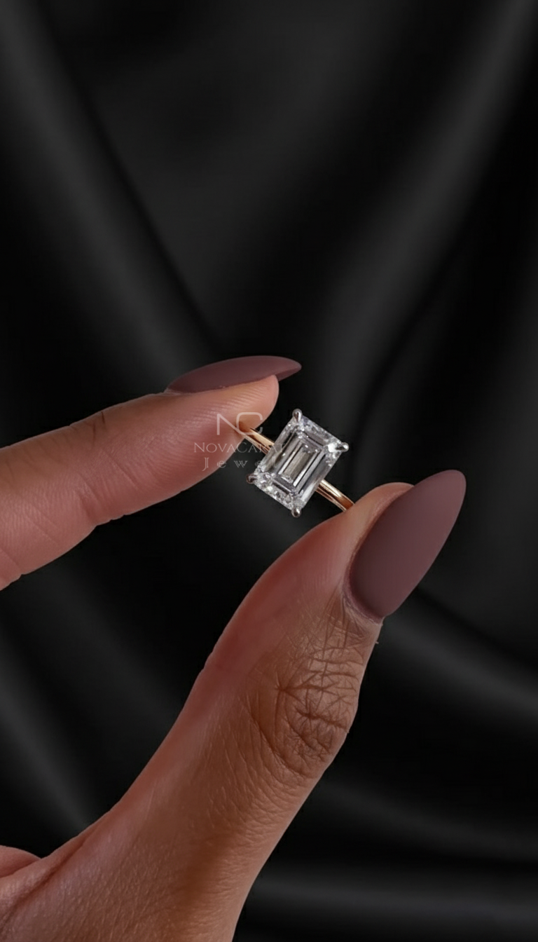 Side profile of emerald cut lab diamond ring in yellow gold with slim band, a minimalist solitaire engagement ring crafted as an ethical and timeless gift. Emerald Lab Diamond Thin Ring, Two Tone Ring, Emerald Cut Engagement Ring, Wedding Ring For Women, 14k Solid Gold Emerald Diamond Ring, Solitaire Ring Plain Band, Classic Proposal Ring, Birthday Gift, Anniversary Gift, Diamond Solitaire Engagement Ring, Classic Proposal Ring, Birthday Gift, Modern Bridal Ring Promise ring, Jewelry