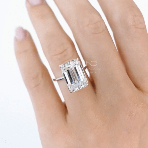 Studio lit emerald cut Moissanite diamond ring, flawless VVS clarity, rose gold plated solitaire mount, premium engagement jewelry blending sustainability and luxury brilliance. Moissanite Diamond Ring, VVS Emerald Cut Moissanite Diamond Engagement Ring, Solitaire Ring, Rose Gold Plated Emerald cut Diamond ring, Gift For Her, Certified Emerald Cut Moissanite Diamond Solitaire Engagement Ring, Proposal Ring, Emerald Cut Moissanite Diamond Engagement Ring, Rose Gold Plated Wedding Ring, Solitaire Ring, Emerald Cut Ring For Her, Bridal Ring