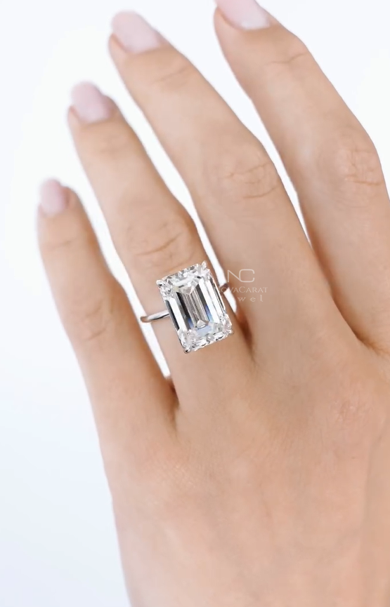 Studio lit emerald cut Moissanite diamond ring, flawless VVS clarity, rose gold plated solitaire mount, premium engagement jewelry blending sustainability and luxury brilliance. Moissanite Diamond Ring, VVS Emerald Cut Moissanite Diamond Engagement Ring, Solitaire Ring, Rose Gold Plated Emerald cut Diamond ring, Gift For Her, Certified Emerald Cut Moissanite Diamond Solitaire Engagement Ring, Proposal Ring, Emerald Cut Moissanite Diamond Engagement Ring, Rose Gold Plated Wedding Ring, Solitaire Ring, Emerald Cut Ring For Her, Bridal Ring