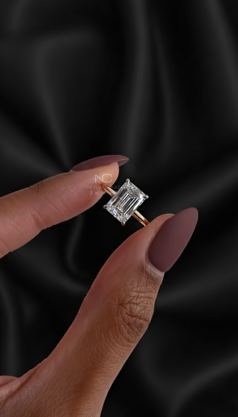 Emerald cut lab grown diamond solitaire ring in 14k gold with a dainty band, left angle view showing minimalist design for proposal and anniversary gift. Minimalist Ring, Emerald Lab Diamond Thin Ring, Minimal Diamond Ring, Thin Engagement Ring, Handmade of Solid Gold Ring, Ethical Ring, Proposal Gift for Her, Elegant Bridal Jewelry for Her, 4 Prong Dainty Ring, Diamond Ring for Her, Handmade Jewelry, One Diamond Ring, Two Tone Ring, 14K White Gold Ring, Ethical Diamond Jewelry