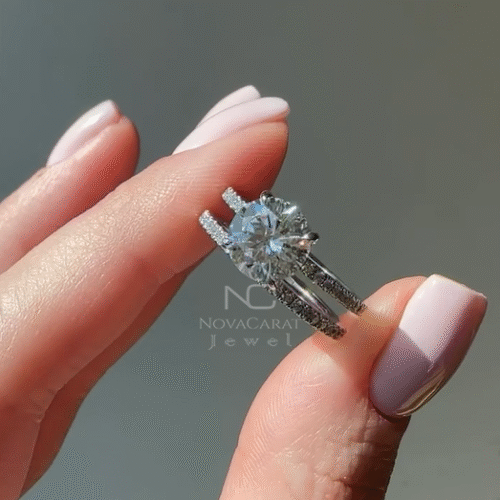 Close up of round brilliant moissanite solitaire ring, ideal cut diamond clarity in 4 prong white gold setting, elegant engagement and anniversary jewelry for women. Round cut moissanite diamond solitaire ring in 14k white gold. Classic 4 prong engagement or anniversary ring, brilliant ideal cut, perfect gift for her. White Solid Gold, Wedding Ring, Anniversary Gift for Women, Promise ring, Round Moissanite Engagement Ring Set White Gold Engagement Ring, Wedding Ring Bridal Set Promise Anniversary Gift