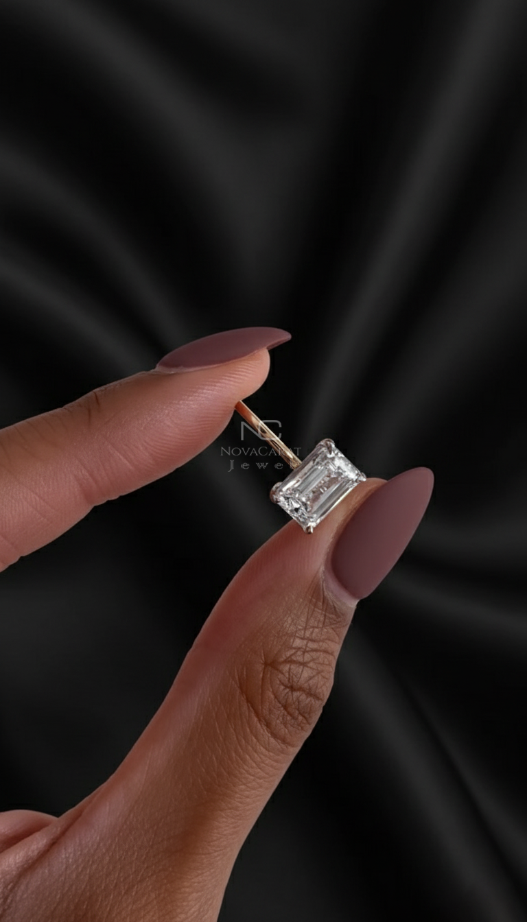 Front angle of emerald cut solitaire lab grown diamond engagement ring in 14k gold, a modern minimalist ring designed for proposals and weddings. Emerald Cut Lab Grown Diamond Ring Solitaire Ring, 14k Gold Dainty Band, Ethical Ring, Minimalist Ring, Dainty Ring, Proposal Ring Gift, 14K Solid Gold Wedding Ring, Thin Engagement Ring, Gift for Anniversary, Two Tone Ring, White Gold Ring, Gift For Girlfriend, Anniversary Ring For Gift, Comftable Ring, Daily Wear Ring, Simple Diamond Ring